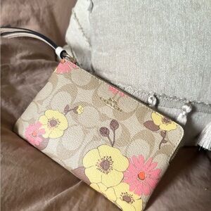 Coach Beige Wristlet with Yellow and Pink Floral Design